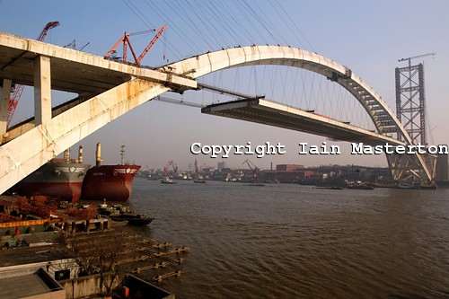 Lupu Bridge,Shanghai,China,world's longest arch bridge,Shanghai Science Commission and Engineering Administration,precise jointing,huangpu river,pudong,lupu bridge sightseeing