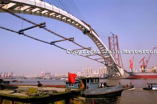 Lupu Bridge,Shanghai,China,world's longest arch bridge,Shanghai Science Commission and Engineering Administration,precise jointing,huangpu river,pudong,lupu bridge sightseeing